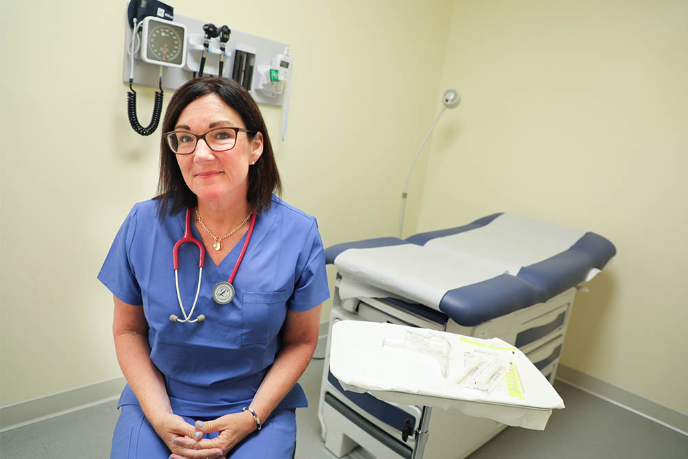 A nurse in an exam room