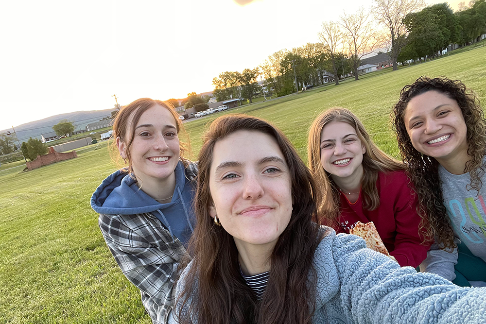 Photo of ABSN student McKenna Mason enjoying the outdoors with nursing freinds.