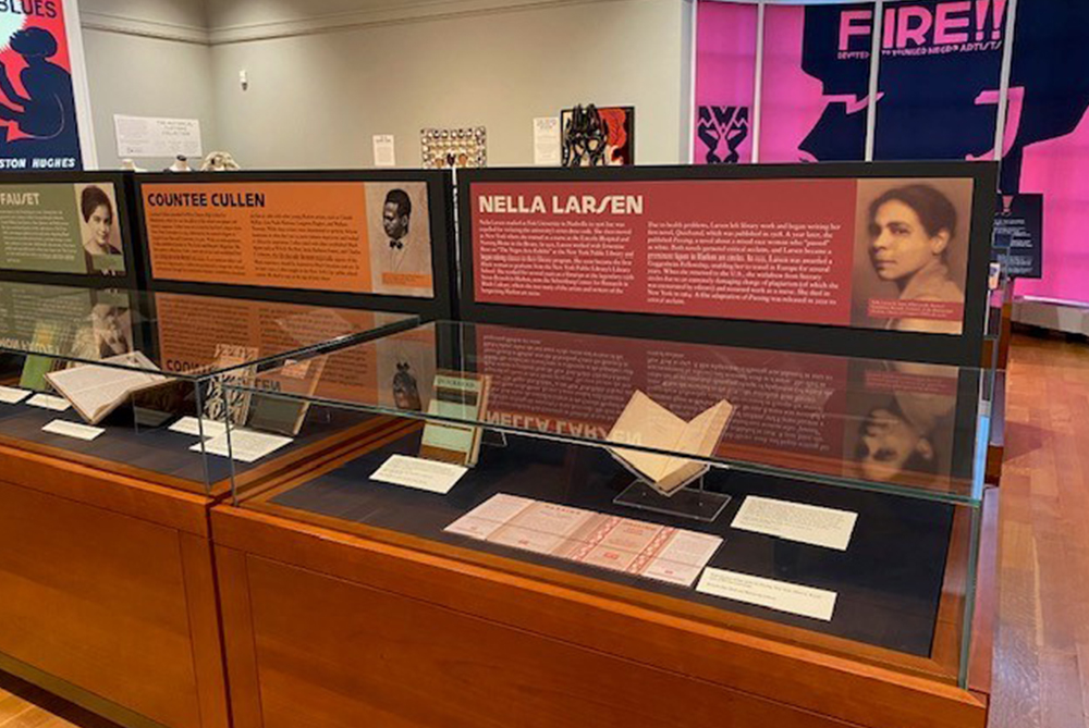 A exhibit case featuring the novels of Nella Larsen