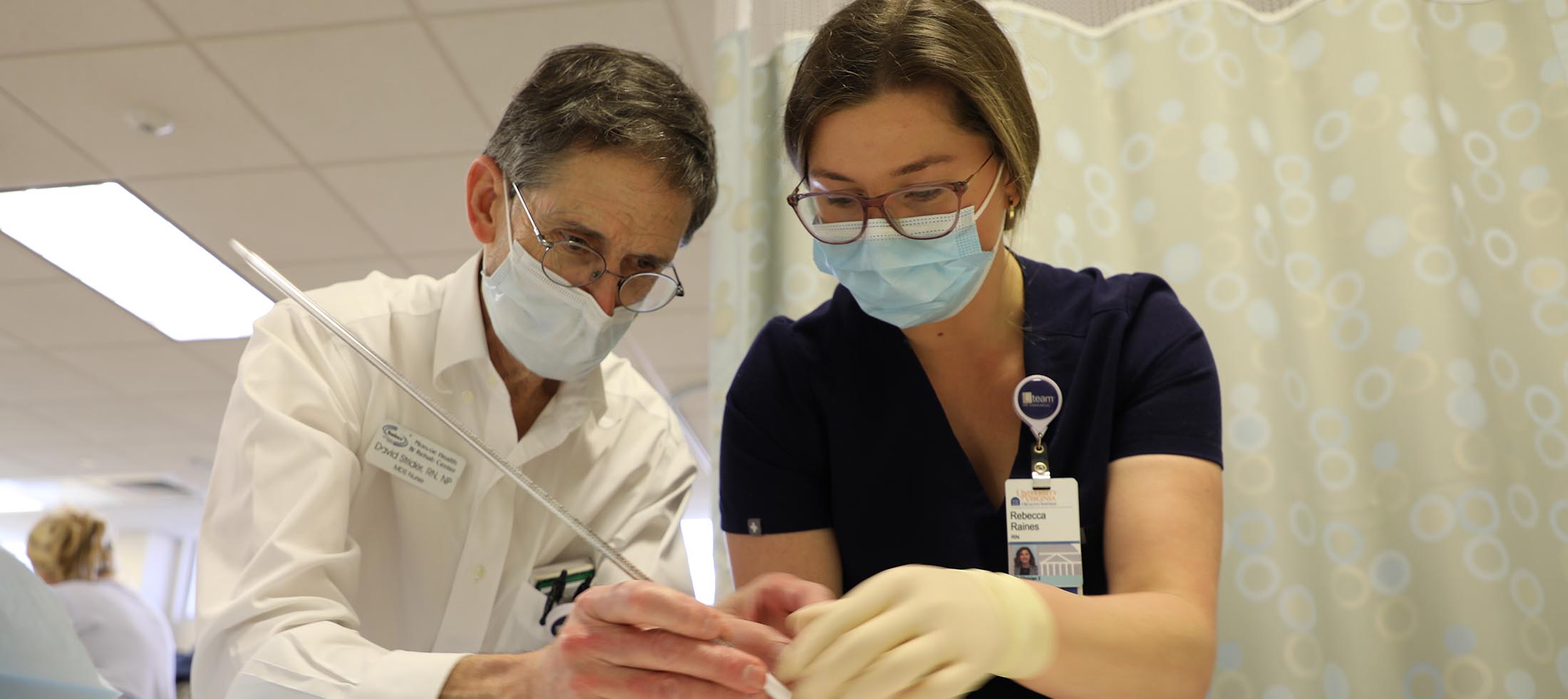 A nurse learning a skill