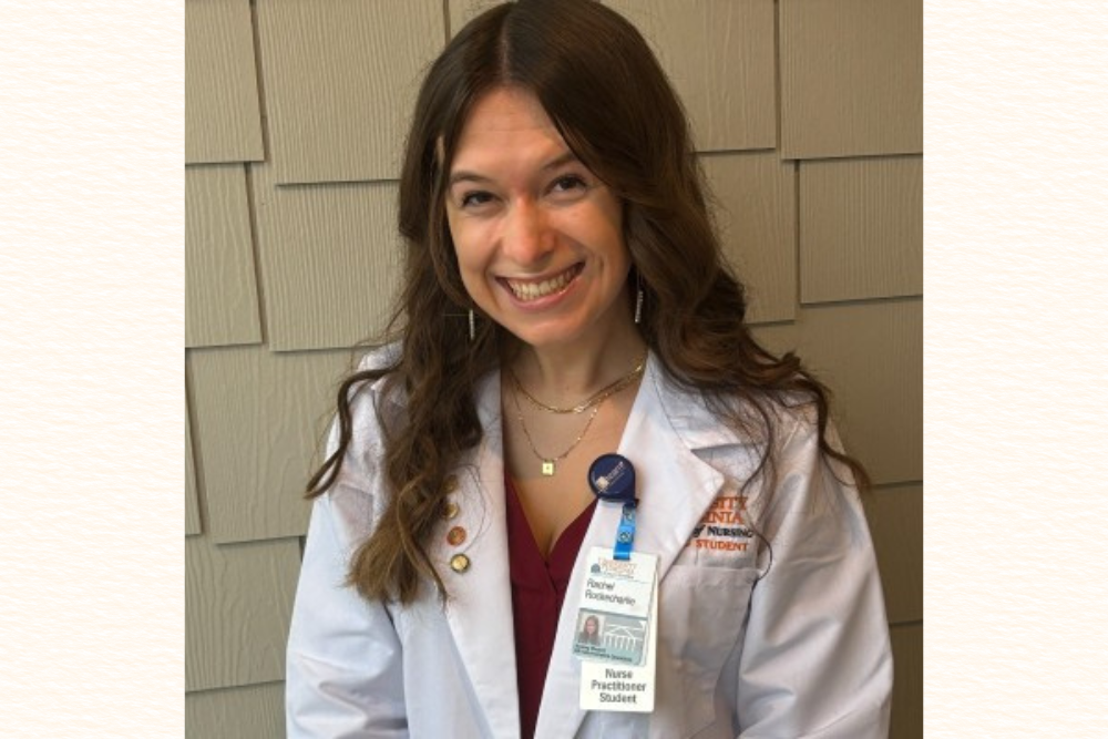Close up photo of a smiling nurse in white lab coat