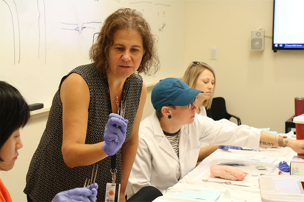 A nursing professor teaching students
