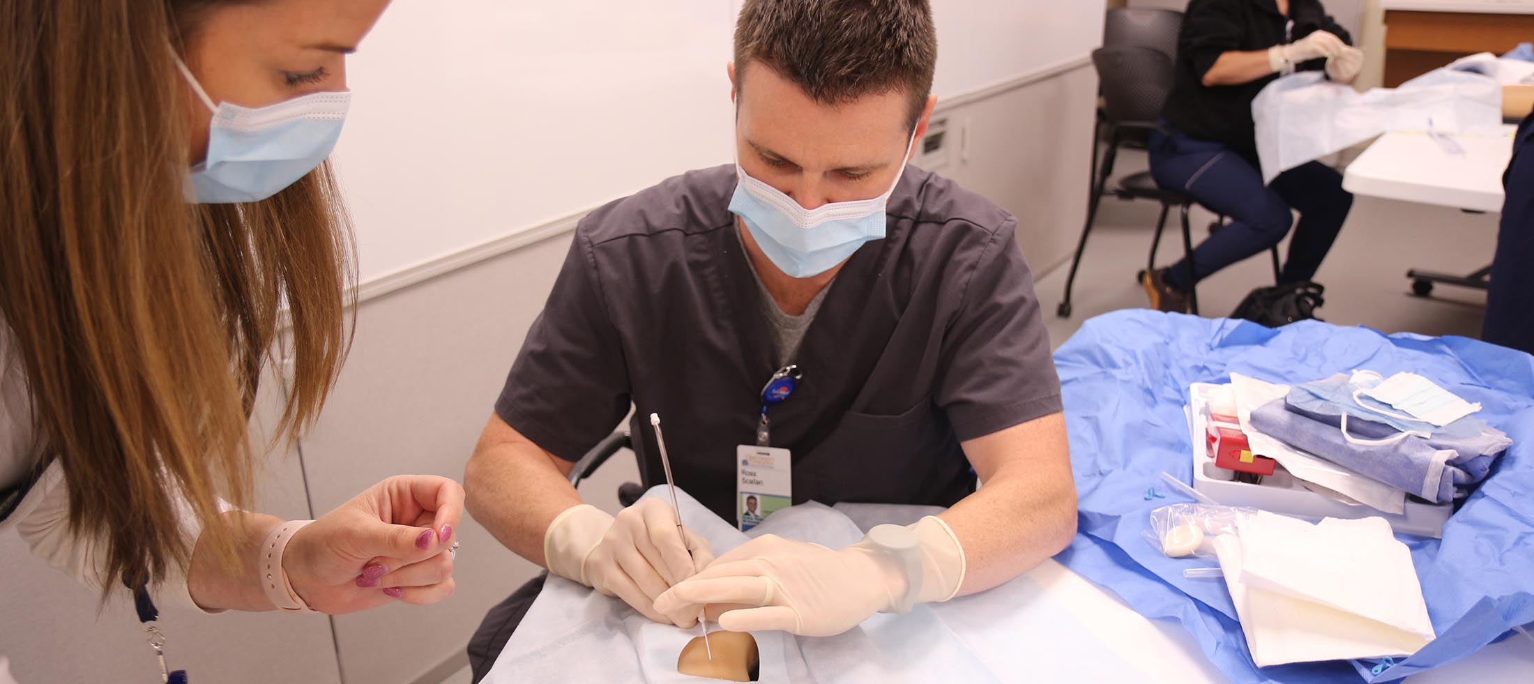 A nurse practitioner in the sim lab